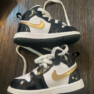 Toddler Jordan 1 Mid size 5C. Black/gold/white. Perfect condition
